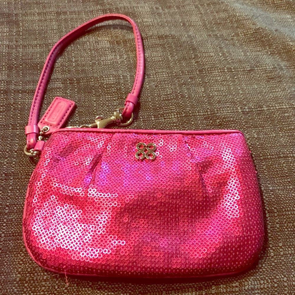 Coach Pink sequin wristlet